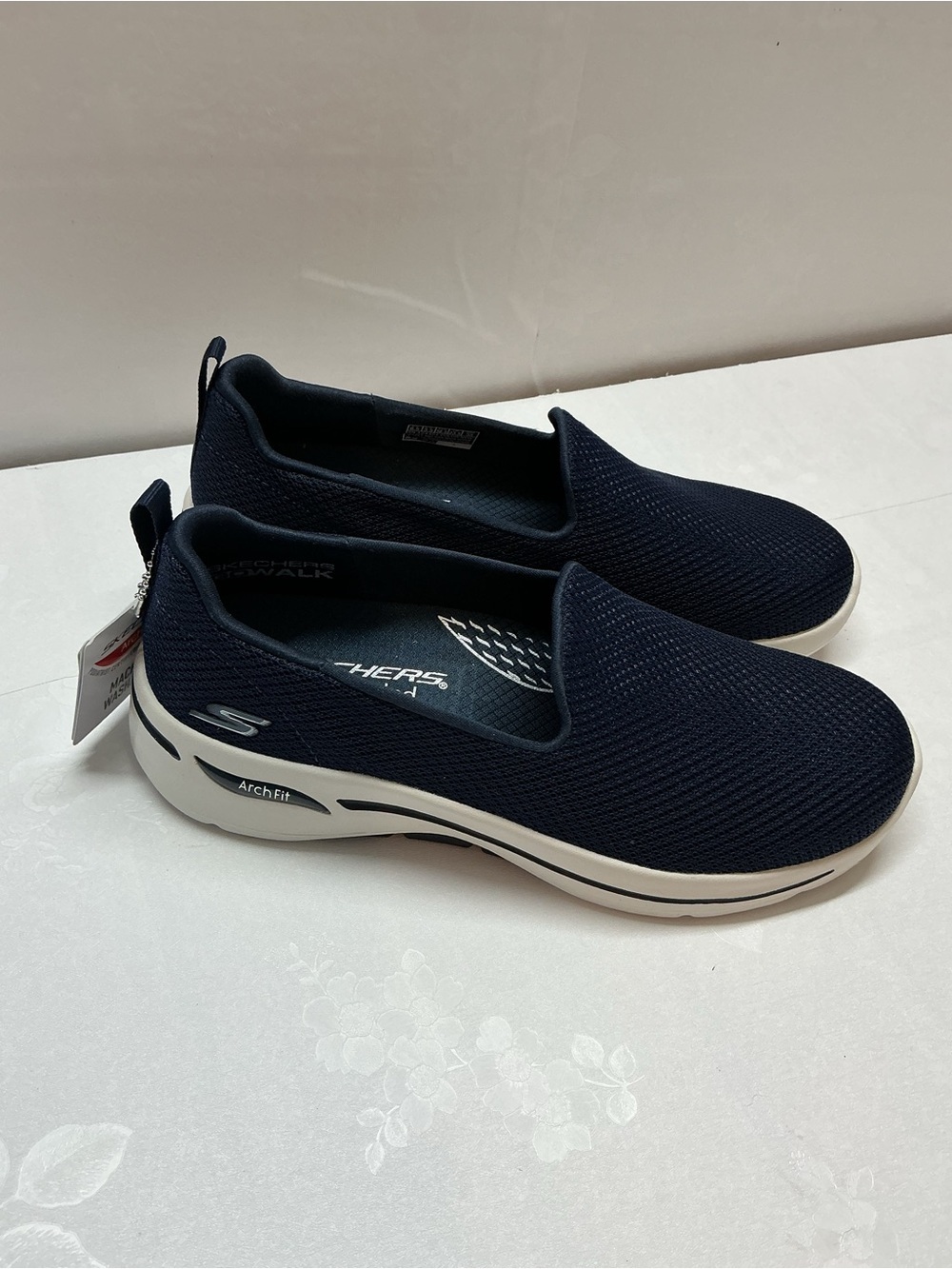 Skechers Navy Slip-On Arch Fit Sneakers with White Sole